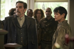 Supernatural -- "Raising Hell" -- Image Number: SN1503A_0153b.jpg -- Pictured (L-R): Lane Davies as Francis Tumblety and Osric Chau as Kevin Tran -- Photo: Colin Bentley/The CW -- © 2019 The CW Network, LLC. All Rights Reserved.