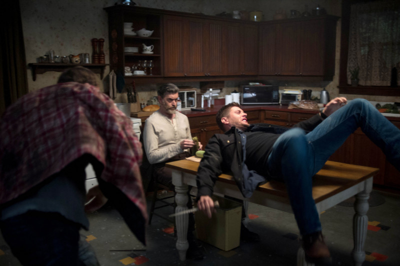 Supernatural -- "First Born" -- Image SN911b_0047 -- Pictured (L-R): Tim Omundson as Cain and Jensen Ackles as Dean -- Credit: Diyah Pera/The CW --  &copy; 2014 The CW Network, LLC. All Rights Reserved