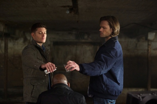 Supernatural -- "Taxi Driver" -- Image SN819a_0234 -- Pictured (L-R): Jensen Ackles as Dean, Doron Bell as Crossroads Demon and  Jared Padalecki as Sam-- Credit: Diyah Pera/The CW -- &copy; 2013 The CW Network. All Rights Reserved