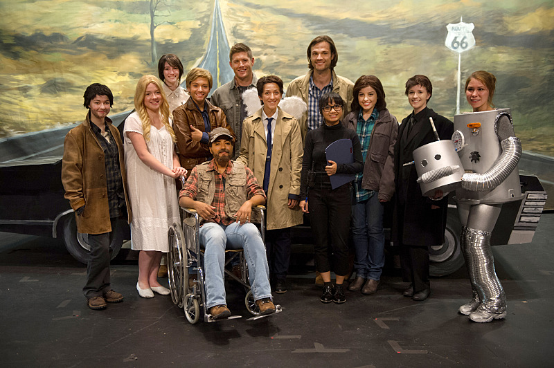 Supernatural -- "Fan Fiction" -- Image SN1005d_0274 -- Pictured (back row center L-R): Jensen Ackles as Dean and Jared Padalecki as Sam surrounded by cast of Supernatural: The Musical!" -- Credit: Diyah Pera/The CW --  ÃÂ© 2014 The CW Network, LLC. All Rights Reserved