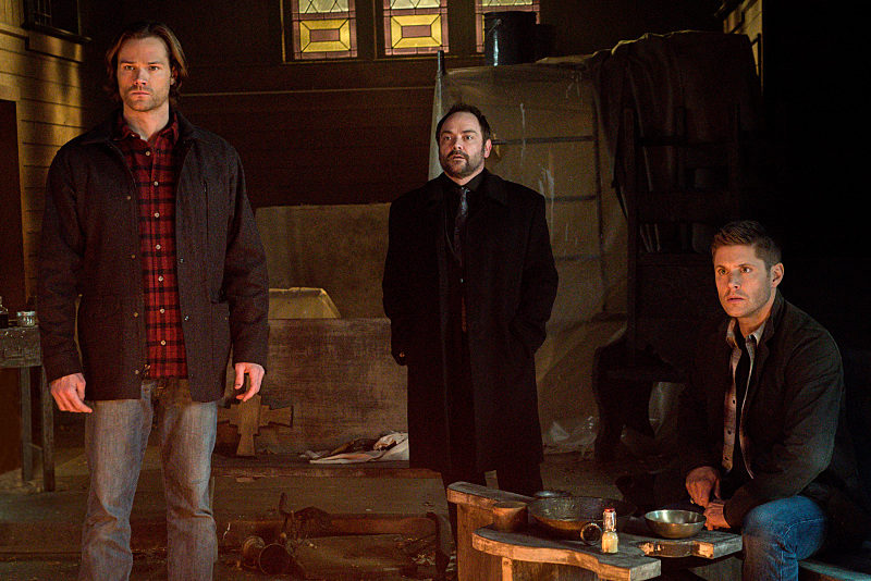 Supernatural -- "Hell's Angel" -- ImageSN1118A_0353.jpg -- Pictured (L-R): Jared Padalecki as Sam, Mark Sheppard as Crowley and Jensen Ackles as Dean -- Photo: Liane Hentscher /The CW -- ÃÂ© 2016 The CW Network, LLC. All Rights Reserved